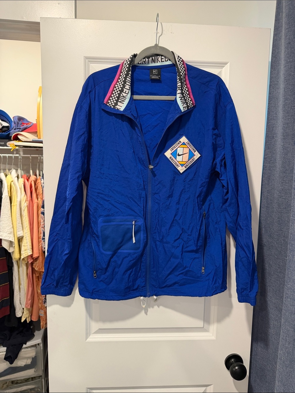Nike Blue Tennis Jacket with Pink Collar Trim